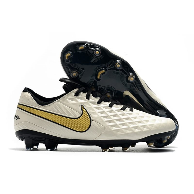 white and gold nike tiempo football boots